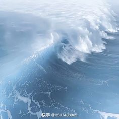 an ocean wave is breaking into the water