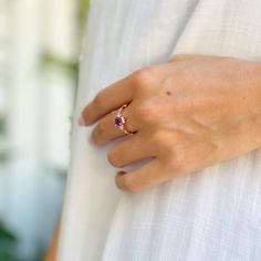 A delicate ring featuring genuine amethyst gemstone adorned with sparkling cubic zirconia. This dainty piece comes in a 14K rose gold plating over sterling silver. 

Stone Name: Amethyst | Color: Purple | 14K Gold Plated | Emerald Cut | Gift: Amethyst Promise Ring Vintage Amethyst Ring, Amethyst Ring Vintage, Promise Rings Vintage, Amethyst Engagement Ring, Amethyst Ring Engagement, Engagement Ring For Women, Amethyst Color, Healing Jewelry, Ring Rose Gold