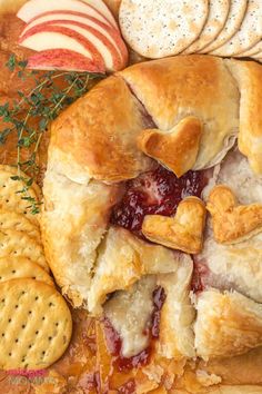 a close up of food on a plate with crackers