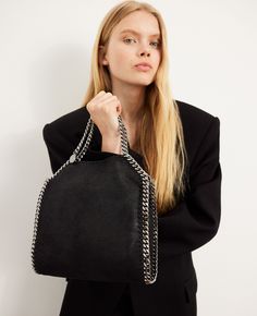 Discover Stella's Black Falabella Mini Tote Bag today. Free standard shipping is available on all orders. Shop online now. Everyday Luxury Tote Shoulder Bag, Handheld Luxury Bags For Everyday Use, Chic Everyday Luxury Bags, Handheld Bags For Everyday Luxury, Luxury Bags With Chain Strap And Double Handle, Stella Mccartney Falabella Mini, Deer Fabric, Stella Mc, Stella Mccartney Falabella