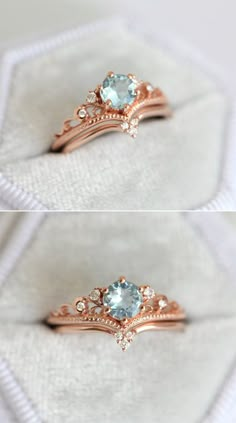 two different views of an engagement ring with blue topazte and diamonds on it