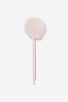 a pink pen with a fluffy ball on it