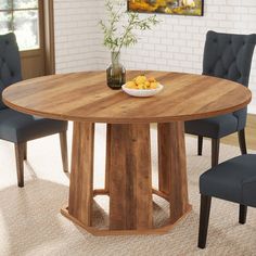 Farmhouse Style - This round dining table features a rustic wood grain finish top and an unique wooden pedestal base, creating a warm and charming farmhouse ambiance. Room for All - Measuring 47.24"L x 47.24"W x 29.53"H, this kitchen table comfortably seats 4-6 people, providing ample tabletop space for meals and tableware. Built to Last - Built with 1.18" thick MDF and a sturdy wooden base, this round table offers endurance and longevity, featuring a scratch-resistant and easy to clean tabletop. Adaptable and Practical - Suited for petite dining spaces or breakfast nooks, this compact table is ideal for family dinners, game nights, or gatherings with friends. Simple Assembly - All essential hardware, tools, and clear instructions are included. Reach out to us with any product-related ques Round Dining Table Farmhouse, Wood Dinner Table, Circle Dining Table, Round Conference Table, Farmhouse Kitchen Table, Compact Table, Wooden Pedestal, Breakfast Nooks, Modern Farmhouse Bathroom Rug