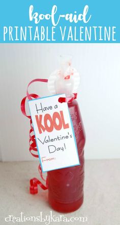 a valentine's day treat in a bottle with a sign that says have a kool valentine's day