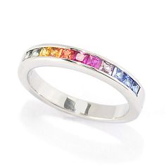 Slip this ring on to adorn your finger in a dazzling band of color! Radiant cut sapphires in a rainbow of colors including blue  pink and yellow stretch across the front of the piece in channel settings. Just above and below the stones you get a glimpse of the polished metal  which comes in your choice of 18K vermeil or platinum plated sterling silver. Wear this ring by itself to add a splash of color to your ensemble  or stack it with others in your collection to create a look that's unique to Sapphire Band Ring, Sapphire Band, Radiant Cut, Pink And Yellow, Band Ring, Color Splash, Band Rings, Platinum, Sapphire