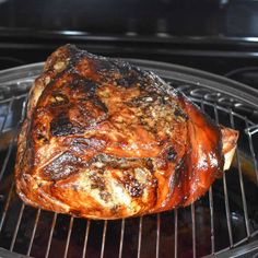 the meat is cooking on the grill in the oven, and ready to be cooked