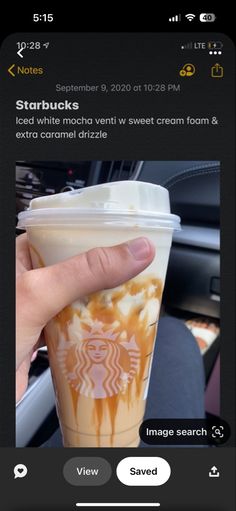 someone is holding up a starbucks cup with caramel drizzle on the side