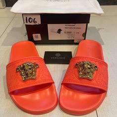 Hi!! I Am Selling These Brand New Versace Gomma Pool Slide In Bright Coral Size 37 Or 7. These Are Womens Sandals Brand New In The Box And This Listing Comes With The Shoes, Original Box, Dust Bag And Authenticity Card. These Are Perfect For Summer And Absolutely Adorable For Pool Or Casual Wear!!! Goes Perfect With Every Outfit! These Retail For $425 And Were Purchased At Saks Fifth Avenue! Let Me Know If You Have Any Questions! Have A Great Day! Designer Flat Slides For Summer, Designer Summer Flat Slides, Summer Designer Flat Slides, Designer Beach Slides With Flat Heel, Designer Flat Heel Slides For Beach, Designer Round Toe Slides For Summer, Designer Round Toe Summer Slides, Luxury Slip-on Slides For Summer, Designer Slides With Flat Heel For Summer