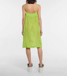 Add a '90s note to looks with this silk slip dress from Dries Van Noten. In an eye-catching neon hue, it features open ladder stitching below the bust..Material: 100% silk.Care instructions: dry clean.Made in India.Designer color name: Neon Green.True to size.Semi-sheer.Designed for a loose fit.Lightweight material.The model seen in the picture is 178cm-5'10' and wearing a size FR 36 Green Summer Slip Dress, Casual Green Summer Slip Dress, Green Casual Summer Slip Dress, Green Casual Slip Dress For Summer, Green Midi Length Slip Dress For Spring, Green Slip Dress For Summer Daywear, Green Sleeveless Slip Dress For Daywear, Ladder Stitch, Silk Slip Dress