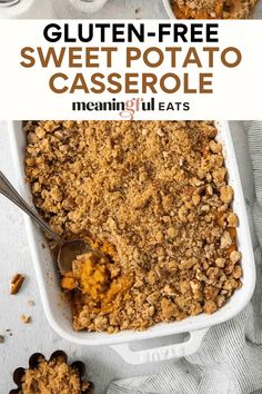 a casserole dish filled with sweet potatoes and topped with crumbs