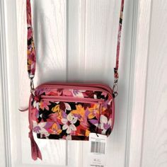 Floral Pattern Vera Bradley Rfid Wallet Crossbody Adjustable Strap. Is New With Tags. Has From Shelf Wear A Very Light Mark On The One Petal That I Do Believe Would Come Out. Picture #3 Shows This Area Up Close. There Are Also A Few Strings That Could Be Clipped That Do Not Appear To Affect The Wallet In Any Way. Bag Is Exactly The One Shown. Please View Pictures. Has Several Compartments And Is A Rfid Wallet That Protects Your Cards. Vera Bradley Crossbody Bag, Vera Bradley Crossbody Purses, Lanyard Wallet Vera Bradley, Vera Bradley Backpack Butterfly, Vera Bradley Blue Island Medallion, Vera Bradley Wallet, Rfid Wallet, Cell Phone Holster, Phone Holster