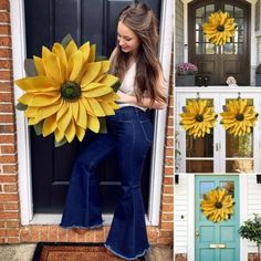 a woman standing in front of a door holding a giant sunflower next to her