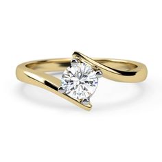 a yellow gold ring with a single diamond in the center and a curved band around it