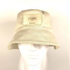 Outside:Light Stains Inside:Stain Name: Fendi Logo Hat Hat Bucket Hat Bob Hat Hat Shape: Hat Model No.: Fxq801 Color: Beige Material: Cotton Approx Size: Around The Head: 22.6inch / 57.5cm Brim Long2.6inch / 6.5cm Listed Hand Measurements May Have A 1-2cm Difference. Gender: Women's Additional Items: None Bob Hat, Hat Model, Hand Measurements, Fendi Accessories, Logo Hat, Fendi Logo, Light Stain, The Head, Beige Color