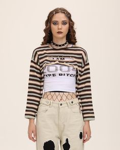 Model (WearingXS):•Â?/span>Height: 174cm | Bust: 80cm | Waist: 60cm | Hips: 89cm | Shoes: 38cmDetails: Long-sleeve crop top with front cut-out details and stripes patternTop Length: CroppedSleeve Length: Long SleevesMaterials:95% Polyester + 5% Spandex Trendy Striped Stretch Sweater, Y2k Style Knitted Sweater For Fall, Y2k Knitted Fall Sweater, Y2k Style Fitted Sweater, Stretch Knit Sweater For Streetwear, Fitted Cotton Y2k Sweater, Striped Stretch Sweater For Fall, Striped Long Sleeve Knit Top For Fall, Knitted Tops For Spring Streetwear