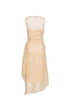 Asymmetric silk dress with hand beaded crystal embellishmentsBelt can be tied around the waist or leave it loose. Comes with 100% silk slip dressComposition: 100% Silk / Slip: 100% SilkDry Clean Only Fit and Model Size Model is 183cm/ 6'0" and wears UK size 8 Fits true to size, however those who are between sizes should take the larger size Light weight fabric, non stretch Designed to be fitted at the bust, can be worn loose or fitted at waist, slightly loose at the hip Asymmetric Dress, Silk Slip Dress, Silk Slip, Crystal Embellishment, Hand Beading, Waist Tie, Silk Dress, Crystal Beads, Embellishments