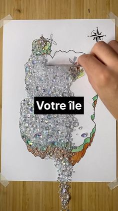 a hand holding a piece of paper with the word votre lie on it