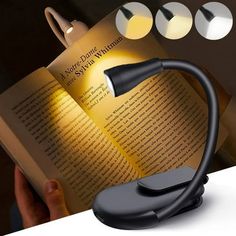 an image of a person reading a book with a lamp on it's side