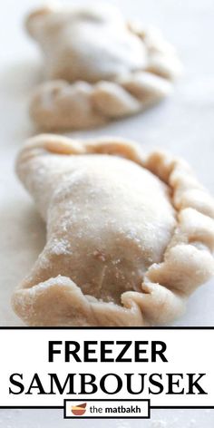 two small pastries sitting on top of a white countertop with the words freezer sambusek in front of them