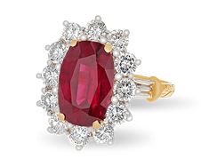 an oval shaped ruby and diamond ring