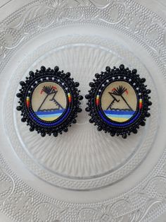 Made with painted parfleche centers, Miyuki delica beads and black rhinestones. Edged in black facet rondelle beads and backed in faux black leather on fingernail posts. Earring Inspo, Miyuki Delica Beads, Earrings Beaded, Delica Beads, Black Rhinestone, Ethnic Jewelry, Jewelry Earrings Studs, Beaded Earrings, Etsy Earrings