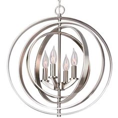 a silver chandelier with four candles in it