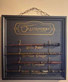 a harry potter wands display hanging on the wall