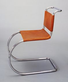 a chair that is made out of metal and leather