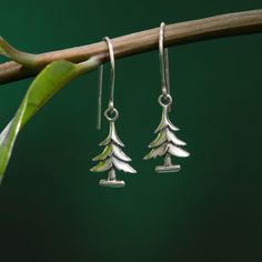 Made with genuine 925 Sterling Silver Nickel-free and lead-free Hypoallergenic and antimicrobial Boma 925 hallmark is located on the inner side of the ear wire. Code : EDA 2737 Dimensions : approx. 1/8" depth x 3/8" width x 1 1/8" height Pine tree drop earrings that speak volumes. We are all ears. Whether you're looking for a unique pair of everyday earrings or something extra special to layer with your favorite pieces, our drop down earrings are perfect to complete your look and complement your Metal Cart, Silver And Gold Jewelry, Everyday Earrings, Seattle Washington, Jewelry Companies, Love Symbols, Pine Tree, Ear Wire, Ring Bracelet