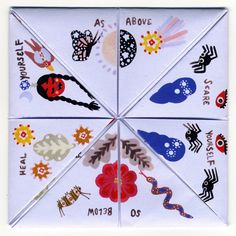 an origami kite with different designs on it