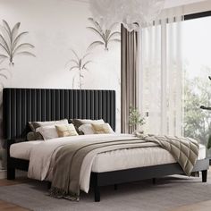 a bedroom with a large bed in the center and a plant on the other side