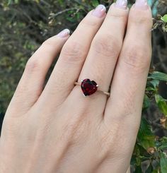 "A romantic Heart-Shaped genuine faceted Red Garnet prong set on a tapered band handcrafted in your choice of metal such as Silver, Rose Plated Silver, Gold Plated Silver. Add your Personalize touch by Engraving the Ring with a Memorable Message, Max 12 Letters.. This beauty makes a great Birthstone Ring for those January Birthday gals! Wrapped in a box ready for gift-giving.(r-265) Ring Info --------------------- *Genuine Heart-Shaped Garnet measures 8mm; Can be made with other stones *Silver, Classic Heart Ring With Diamond Cut For Valentine's Day, Heart-shaped Gemstone Ring For Valentine's Day, Red Heart Shaped Rings With Accent Stones, Red Heart-shaped Rings With Accent Stones, Heart-shaped Solitaire Birthstone Ring Gift, Classic Heart Cut Ruby Ring For Valentine's Day, Classic Solitaire Jewelry For Valentine's Day, Heart-shaped Ruby Jewelry With Prong Setting, Heart Shaped Ruby Jewelry With Prong Setting