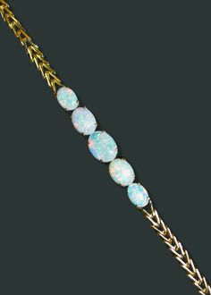 Indulge in the timeless elegance of our Vintage 14K Gold Opal Bracelet. Adorned with a stunning 5-stone setting of opals, this bracelet exudes sophistication and luxury. Details2.5K of White Opal14K Solid GoldLength: 7.5" in Diameter Opal Bracelet, Stone Setting, White Opal, Stone Settings, Timeless Elegance, Solid Gold, Vintage Jewelry, Opal, Bracelet