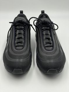 Nike Air Max 97 Ultra 17 Triple Black Men Size 15 918356-002 Style 918356-002 Colorway BLACK/BLACK-BLACK Retail Price $160 Release Date 08/05/2017 Product Description The Nike Air Max 97 Ultra 17 Triple Black reimagines a silhouette introduced in 1997 and updates it with more modern technology. The Nike Air Max 97 Ultra 17 in a Triple Black colorway features a black mesh up upper with undulating black synthetic overlays. The laces are black, as is the tongue, sock liner, insole, and heel tab. The black foam midsole features a visible full-length Air unit, and the black rubber outsole features traction in cleat-like boxes and herringbone-like stripes. What our experts love most about this shoe is the subtle branding. Black-on-black Nike Swooshes appear on the tongue, side panel, and insole, Matte Black Sporty Sneakers For Sports, Nike Black Sneakers With Air Cushioning, Nike Black Functional Sneakers, Black Functional Nike Sneakers, Black Air Max Outdoor Sneakers, Black Air Max Sneakers For Outdoor, Black Air Max Cushioned Sneakers For Outdoor, Black Outdoor Sneakers With Air Max Cushioning, Black Sneakers With Air Cushioning For Outdoor