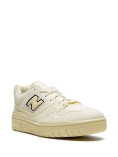 Classic Beige New Balance Sneakers, Beige Leather New Balance Sneakers, Beige Lace-up Sneakers With Embossed Logo, New Balance Beige Sneakers With Rubber Sole, New Balance High-top Sneakers With Gum Sole For Streetwear, Casual Cream Sneakers With Embossed Logo, New Balance Cream Sneakers With Contrast Sole, Classic New Balance Sneakers With Gum Sole, Cream High-top Sneakers With Textured Sole For Streetwear