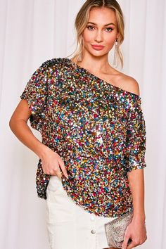 This multi-colored sequin top might be the most fun sequin top ever!!! Features a boat neckline, dolman style sleeves, and a relaxed fit! Boat necklines can be worn on the shoulders or off one shoulder! Good for any occasion. 100% polyesterModel is wearing Size SmallFits True To SizeSize up if you want the off the shoulder look Vegas Lights, Multicolor Sequins, Boat Neckline, Sequin Top, Women Clothing Boutique, Dolman Sleeve, Free Giveaway, Boutique Clothing, Off The Shoulder