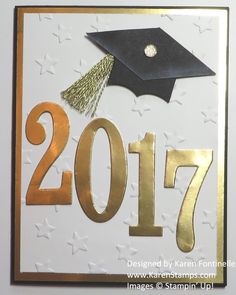 a white and gold graduation card with the number 17 on it's side, which reads 2017