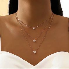 Layered Tiered Zircon Necklace Star, Heart Love, & Teardrop Gold Necklace. Women Layered Tiered Cubic Zirconia Necklace Five-Pointed Star Love Water Drop Necklace. New In Package. Necklace Clavicle Chain. Has Adjustable Chains With The Longest Length 22” Inches, Gold Plated. New In Package. Hearts, Teardrops, Stars Necklace. Water Drop Necklace, Stars Necklace, Necklace Star, Zircon Necklace, Dragonfly Jewelry, Blue Beaded Necklace, Zirconia Necklace, Cubic Zirconia Necklace, Turtle Necklace