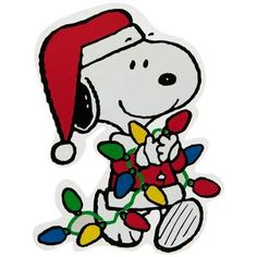 a snoopy christmas sticker with lights and a santa hat on it's head