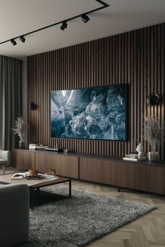 a large television mounted on the wall in a living room