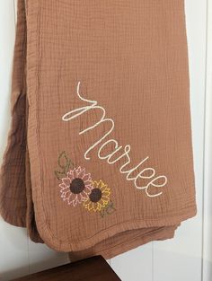 a brown towel with the word hope written on it