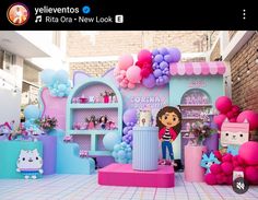 an image of a doll store with balloons and decorations on the walls for children's birthdays