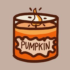 an orange and white candle with the word pumpkin written on it's front side