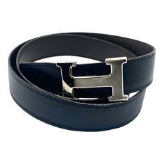 Hermes Constance 32mm Silver H Black Brown Reversible Belt 90cm *Marked Hermes *Made in France *X (2016) *Comes with the original box, dustbag for buckle and ribbon *As seen on too many celebrities -Marked 90 cm/ approximately total length is 39″. -Approximately 34″ to the first hole , 36″. -Unisex -In an excellent condition. 2156-15206  Please see the measurements noted above in the description for best approximate dimensions Luxury Silver Belt With Buckle Closure, Luxury Black Belt Buckles With Silver Buckle, Black Hermes Belt, Luxury Black Belt With Rectangular Buckle, Luxury Black Belt With Silver Buckle, Hermes Belt, Hermes Constance, Reversible Belt, Made In France