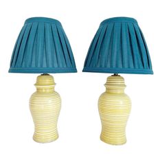 pair of ceramic lamps with pleated shades on white base and light blue shade, circa 1950's