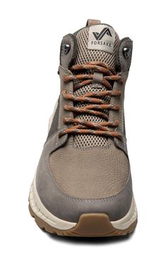 the men's sneaker in grey with brown laces on the outstep