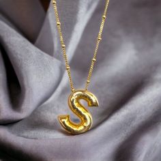 "Balloon Letter Necklace with Beaded Satellite Chain, 14k Gold Bubble Initial Pendant, Custom Puff Letter, Personalized Jewelry, Gift for Her ♛ Material: High Quality Solid 925 Sterling Silver ♛ Finish: Sterling Silver / Gold / Rose Gold Dimensions of the pendant: 17 x 17 mm All pieces will come with a 5\" extension chain so you can fine tune the fit. May you always have your signature necklace with you with the most unique and different jewelry you can find. All products are prepared with great care in our workshop with our masters. ◊ HOW TO MAINTAIN YOUR JEWELRY? ◊ * Separate your silver accessories in a tarnish-proof jewelry box. keep away from abrasive surfaces. (Comes in our Special Design Drawer Box) * To prevent fading, do not store your silver products in sunlight or, Do not keep i Gold Anniversary Letter Beads Necklace, Gold Bubbles, Silver Balloon, Silver Gift Wrap, Signature Necklace, Letter Balloons, Drawer Box, Silver Accessories, Silver Gifts