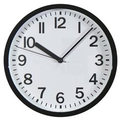 a large black and white clock with numbers on the face is shown against a white background