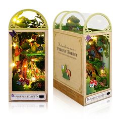 an open box with fairy forest inside it