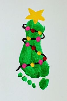 a child's hand made christmas tree decoration